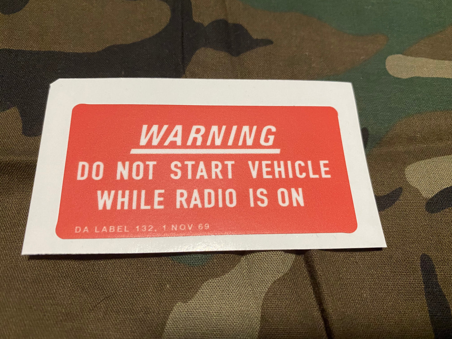 DO NOT START WHILE RADIO IS ON WARNING DECAL (1969 VERSION)