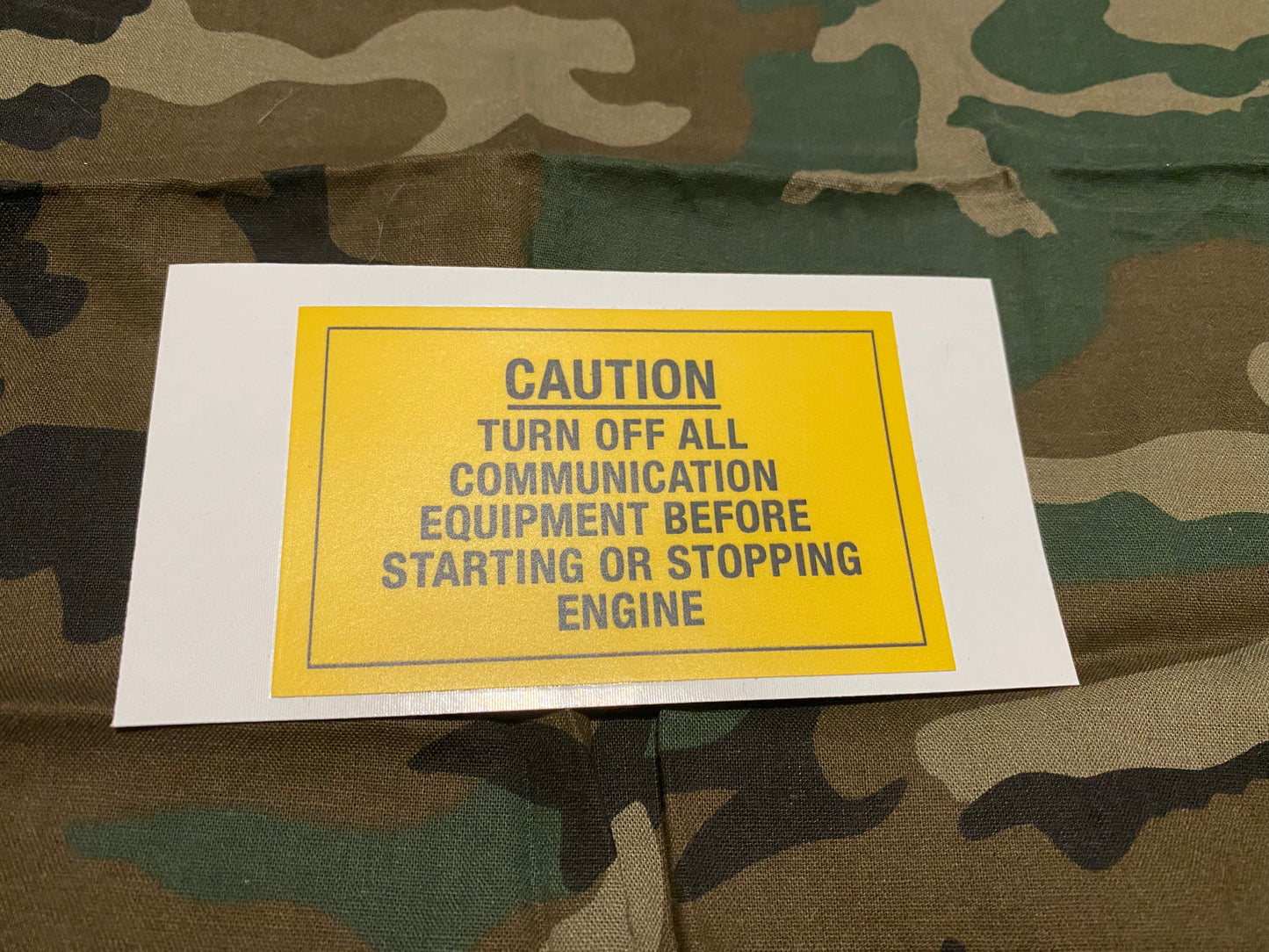 DO NOT START WHILE RADIO IS ON WARNING DECAL (LATE VERSION)